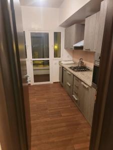 Kuchyň nebo kuchyňský kout v ubytování Apartment Ocean View 2Br