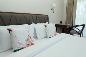 Golden Fields Resort 객실 침대