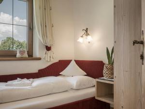 Łóżko lub łóżka w pokoju w obiekcie Apparthotel "Landhaus Veronika"