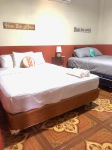 Ένα ή περισσότερα κρεβάτια σε δωμάτιο στο Inner peace-apartamento con piscina en Surf City