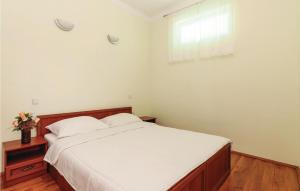 Posteľ alebo postele v izbe v ubytovaní Apartment Ribnica-Krusevo With Sea View Viii