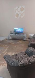 Et tv og/eller underholdning på Salak Lestari Homestay