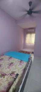 En eller flere senge i et værelse på Salak Lestari Homestay + 3 billeder