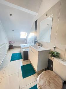 Kúpeľňa v ubytovaní Alpesi Apartman Downtown