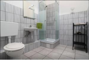 Kúpeľňa v ubytovaní SparrOwl Apartments + 30 fotografií