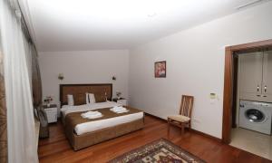 Postel nebo postele na pokoji v ubytování Belle Maison Hotel&Residence