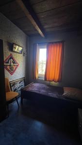Katil atau katil-katil dalam bilik di Dagva Travelers House