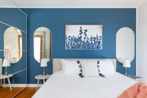 Giường trong phòng chung tại Portopiccolo Apartments Gemma nel Golfo di Trieste - with beach included