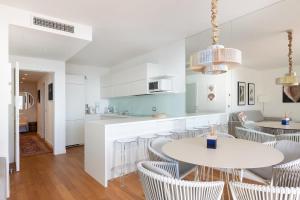 Nhà bếp/bếp nhỏ tại Portopiccolo Apartments Gemma nel Golfo di Trieste - with beach included