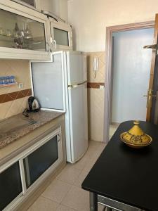 Dapur atau dapur kecil di Appartement convivial -Marrakech
