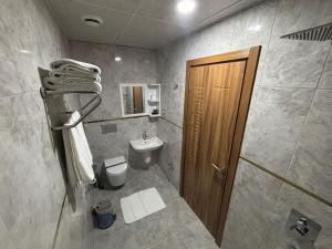Ванная комната в Zümrüt Palas Otel +37 фотографий