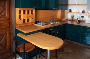 Η κουζίνα ή μικρή κουζίνα στο Casa Piolti Appartamenti di Charme