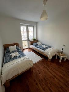 Ένα ή περισσότερα κρεβάτια σε δωμάτιο στο Apartmán pri Stanici