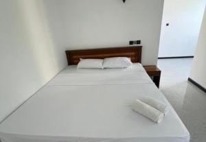 Postel nebo postele na pokoji v ubytování Nio Lit