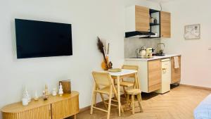 Kuchyň nebo kuchyňský kout v ubytování MY Cabane -POOL HOUSE avec Sauna privée près de Bruxelles
