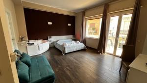 Postel nebo postele na pokoji v ubytování B&B Leus Appartment