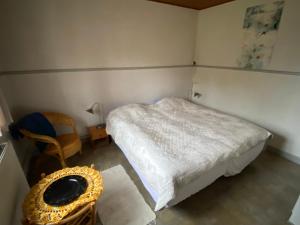 Postel nebo postele na pokoji v ubytování GRUBBE MØLLE Bed & Breakfast