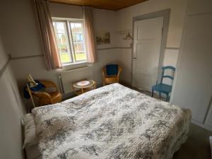 Postel nebo postele na pokoji v ubytování GRUBBE MØLLE Bed & Breakfast