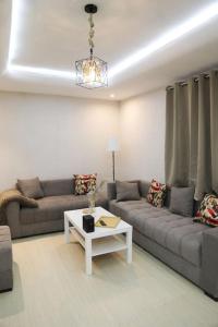 Cozy App in the Heart of Ifrane的休息区