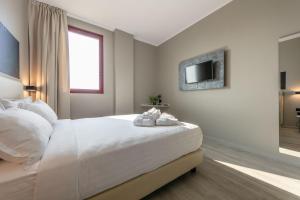 Postel nebo postele na pokoji v ubytování Break Hotel