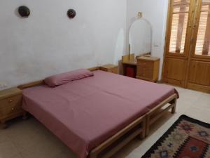 A bed or beds in a room at Adad Noubian House