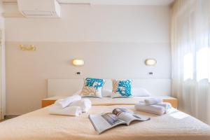 Postel nebo postele na pokoji v ubytování Hotel Selene - Vista Mare