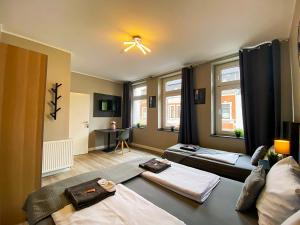 Katil atau katil-katil dalam bilik di LiRo Apartments Jägerstrasse Krefeld