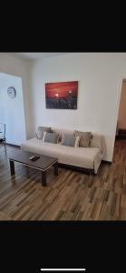 Posezení v ubytování Torrenostra Apartment