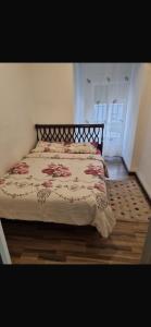 Postel nebo postele na pokoji v ubytování Torrenostra Apartment