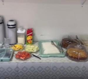 a table with a bunch of food on it at Pousada Terra Bela in Juazeiro do Norte +18 photos
