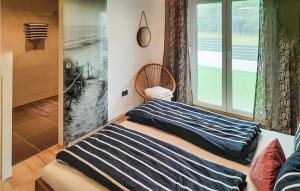 Postel nebo postele na pokoji v ubytování Cozy Home In Peroj With Wifi