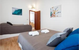 Posteľ alebo postele v izbe v ubytovaní Two-Bedroom Holiday Home In Volme