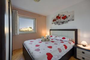 Postel nebo postele na pokoji v ubytování Apartman Matej