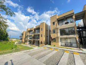 an image of an apartment building at F111- Apartamento cerca al Club Campestre con piscina in La Tebaida