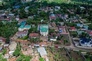 an overhead view of a small town with houses at Afr Hostel in Arusha