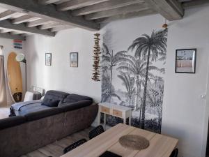 Część wypoczynkowa w obiekcie Maison de vacances 3 chambres avec terrasses