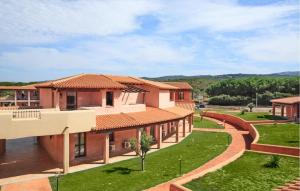 an aerial view of a house with a yard at Vignola Baia Dei Mirti M3 in Vignola Mare