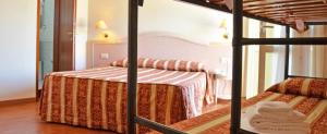 a bedroom with a bed and a bunk bed at Hotel Corallo in Francavilla al Mare +37 photos