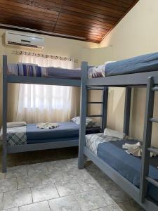 Postel nebo postele na pokoji v ubytování Hotel Morada de Leste Pontal