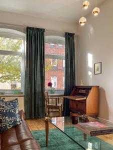 Ruang duduk di CLS Zentrale City-Wohnung in Hildesheim Ost alles in 5 Minuten erreichbar Ostbahnhof, HAWK, Bushaltestelle, Supermarkt, Cafés, Restaurants, HAWK, Uni, ideale Autobahnanbindung, Nähe Bosch