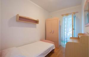 Postel nebo postele na pokoji v ubytování Holiday Home Mala Lozna Ii