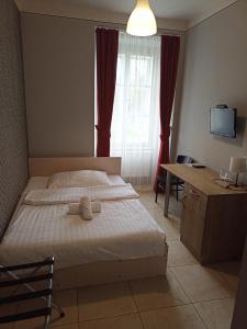 Postelja oz. postelje v sobi nastanitve Penzion U tri statkaru