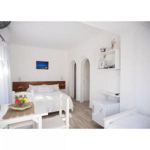 En eller flere senge i et værelse på Casa de mar