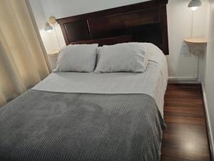 Ένα ή περισσότερα κρεβάτια σε δωμάτιο στο Casona Lorena