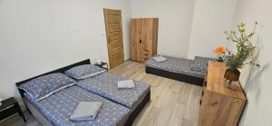 Postel nebo postele na pokoji v ubytování Nowjus
