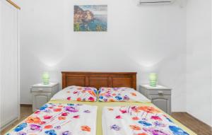 Posteľ alebo postele v izbe v ubytovaní 4 Bedroom Cozy Home In Fazana