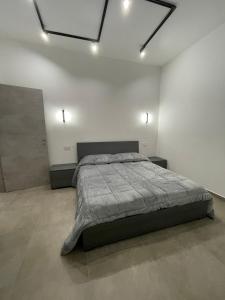 Ένα ή περισσότερα κρεβάτια σε δωμάτιο στο Bergamo Downtown +17 φωτογραφίες