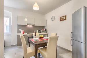Kuchyň nebo kuchyňský kout v ubytování Apartment Spagnolo City