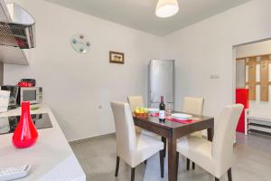 Kuchyň nebo kuchyňský kout v ubytování Apartment Spagnolo City
