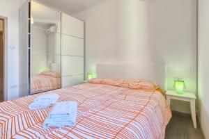 Postel nebo postele na pokoji v ubytování Apartment Spagnolo City